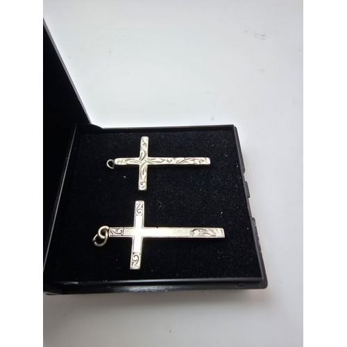 208 - 2x 925 sterling silver Cross formed pendants with different designs, in clean condition and boxed. L... 