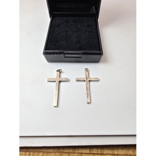 208 - 2x 925 sterling silver Cross formed pendants with different designs, in clean condition and boxed. L... 