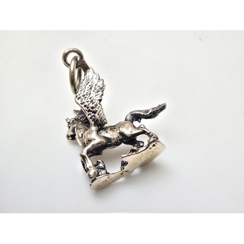 212 - 2x good quality vintage silver charms for charm bracelets to include a flying Pegasus and a lion fig... 