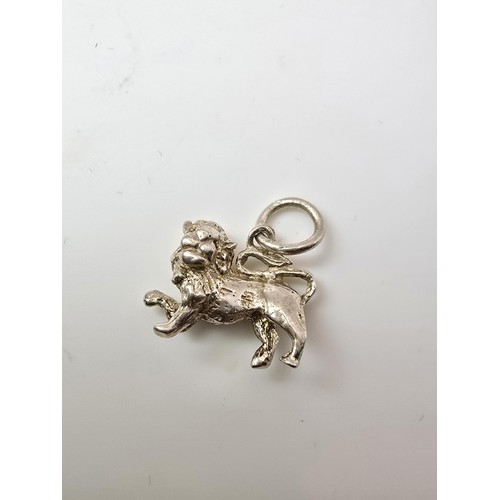 212 - 2x good quality vintage silver charms for charm bracelets to include a flying Pegasus and a lion fig... 