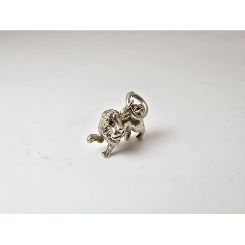 212 - 2x good quality vintage silver charms for charm bracelets to include a flying Pegasus and a lion fig... 