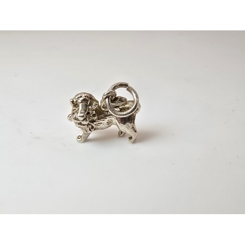 212 - 2x good quality vintage silver charms for charm bracelets to include a flying Pegasus and a lion fig... 