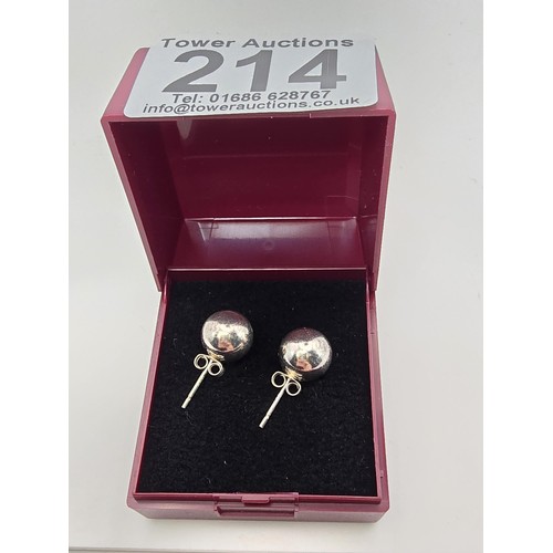 214 - A pair of as new large 925 silver stud ball earrings featuring a large ball stud to the top with a d... 