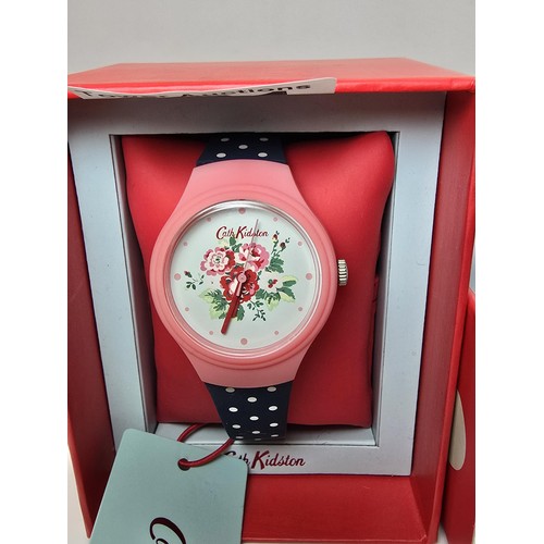 221 - A good designer ladies brand new with tags Cath Kidston with a typical rose design to the face havin... 