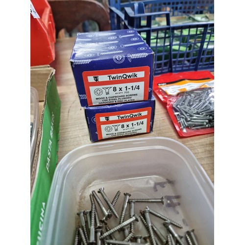 332 - Large quantity of nails screws, boxed masonry nails, rawl plugs etc