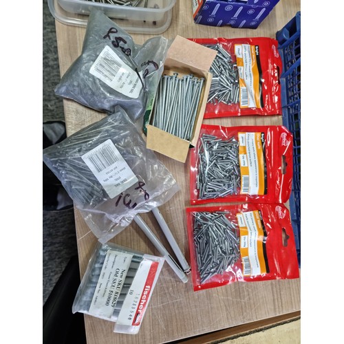 332 - Large quantity of nails screws, boxed masonry nails, rawl plugs etc