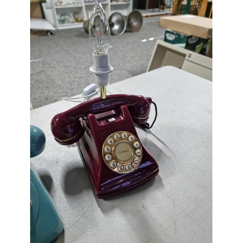 361 - Blue retro style telephone with dial to the front in working order along with a maroon coloured tele... 