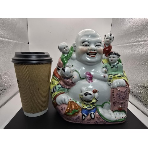 161 - An attractive vintage laughing Buddha Chinese Famille Rose porcelain figure surrounded by children, ... 