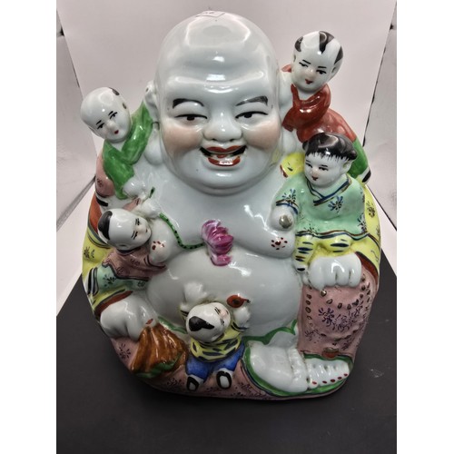 161 - An attractive vintage laughing Buddha Chinese Famille Rose porcelain figure surrounded by children, ... 