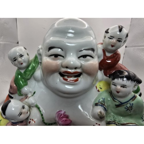 161 - An attractive vintage laughing Buddha Chinese Famille Rose porcelain figure surrounded by children, ... 