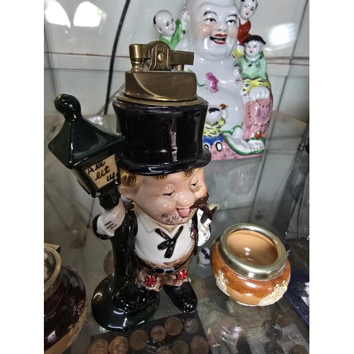 162 - A lot of 3 collectable items to include a very charming vintage ceramic figural table lighter in the... 