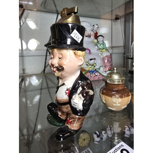 162 - A lot of 3 collectable items to include a very charming vintage ceramic figural table lighter in the... 