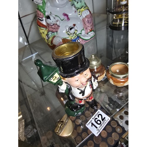 162 - A lot of 3 collectable items to include a very charming vintage ceramic figural table lighter in the... 