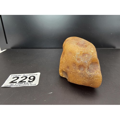 229 - A huge genuine piece of natural raw unpolished honey amber with a weight of 69.6g, this specimen is ... 