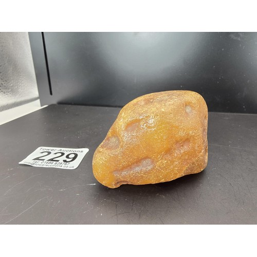 229 - A huge genuine piece of natural raw unpolished honey amber with a weight of 69.6g, this specimen is ... 