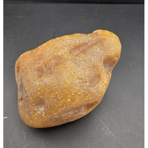 229 - A huge genuine piece of natural raw unpolished honey amber with a weight of 69.6g, this specimen is ... 