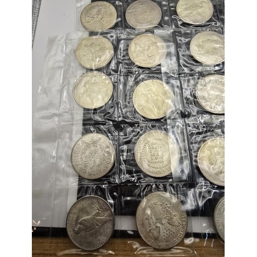 230 - A large collection of approx 48 fantasy and novelty American dollar coins of various designs, these ... 