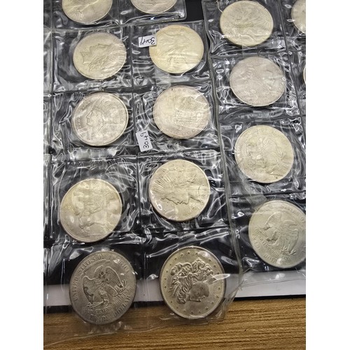 230 - A large collection of approx 48 fantasy and novelty American dollar coins of various designs, these ... 