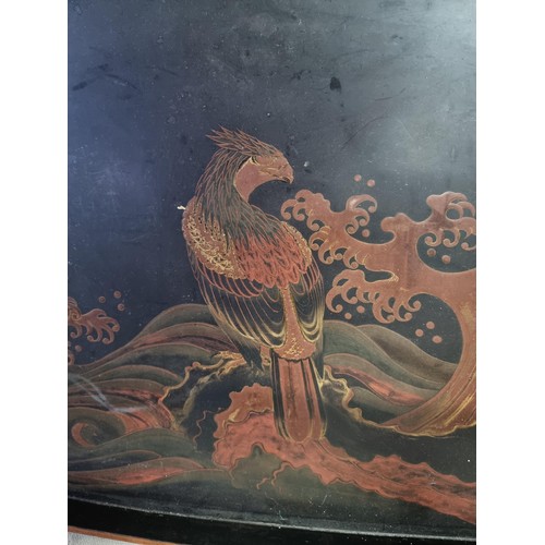 376 - Very large ebony tray with a decoration of an Eagle and tree design, with metal banding around the e... 