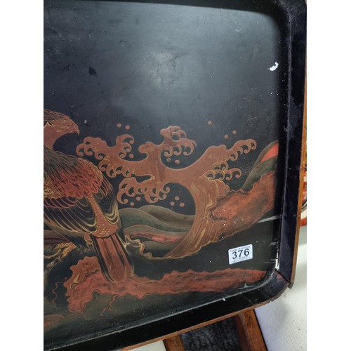 376 - Very large ebony tray with a decoration of an Eagle and tree design, with metal banding around the e... 