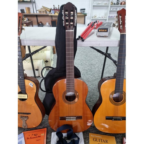 374 - 3 acoustic guitars, including 2 nylon strung classical style models (Odyssey and Herald) along with ... 