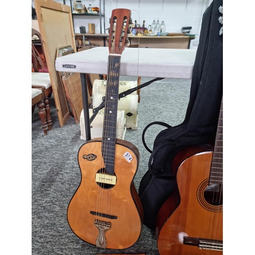 374 - 3 acoustic guitars, including 2 nylon strung classical style models (Odyssey and Herald) along with ... 