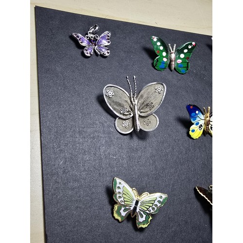 264 - A suite of 9x pretty butterfly brooches which includes a tested as silver butterfly brooch which dou... 