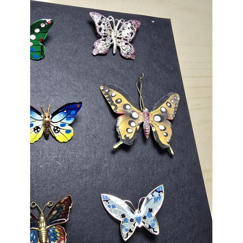 264 - A suite of 9x pretty butterfly brooches which includes a tested as silver butterfly brooch which dou... 