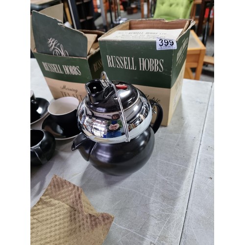 387 - Good quality boxed Russell Hobbs automatic electric tea maker and morning tea set in black the set i... 