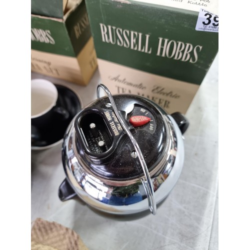 387 - Good quality boxed Russell Hobbs automatic electric tea maker and morning tea set in black the set i... 