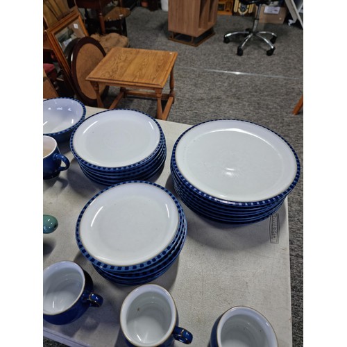 383 - Part dinner set of Denby in blue inc 4x mugs, 5x cups, 3x bowls, 7x dinner plates, 6x salad plates a... 