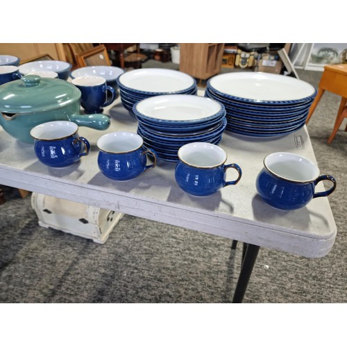 383 - Part dinner set of Denby in blue inc 4x mugs, 5x cups, 3x bowls, 7x dinner plates, 6x salad plates a... 