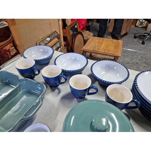 383 - Part dinner set of Denby in blue inc 4x mugs, 5x cups, 3x bowls, 7x dinner plates, 6x salad plates a... 