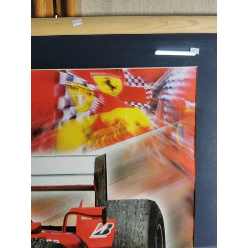 399 - Large framed and glazed print of 7x World Champion Michael Schumacher in a Ferrari Formula One Car w... 