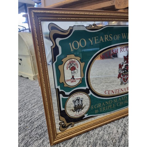 401 - Framed mirror depicting 100 years of welsh rugby dating 1980-81, 8x grand slams and 16 triple crown ... 