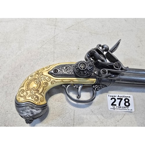 278 - An impressive good quality reproduction Italian flintlock 3 barrel rocker pistol with elaborate deta... 