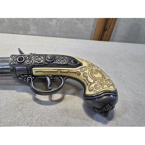 278 - An impressive good quality reproduction Italian flintlock 3 barrel rocker pistol with elaborate deta... 