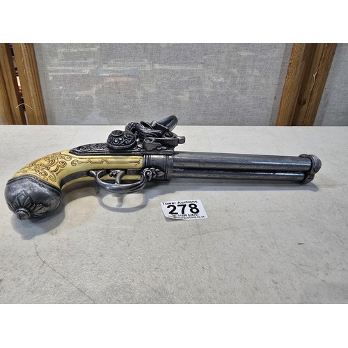 278 - An impressive good quality reproduction Italian flintlock 3 barrel rocker pistol with elaborate deta... 