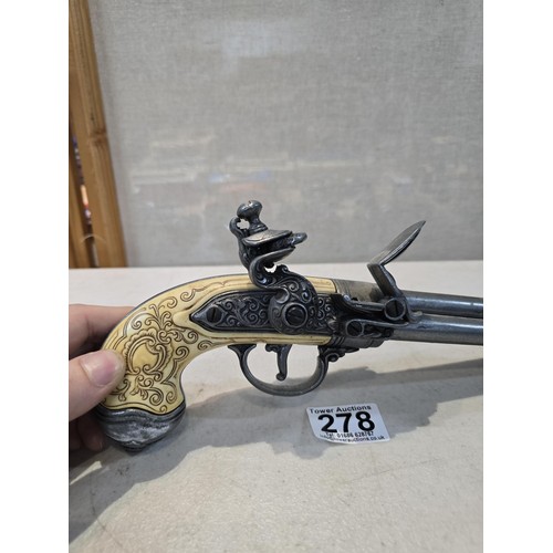 278 - An impressive good quality reproduction Italian flintlock 3 barrel rocker pistol with elaborate deta... 