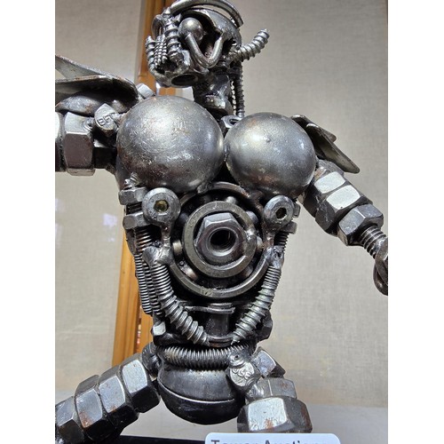 282 - A handmade very impressive metal art sculpture (29cm high) completely made from nuts and bolts spark... 