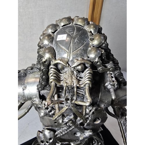 283 - A large and impressive handmade metal art sculpture of The Predator (49cm high) completely made from... 