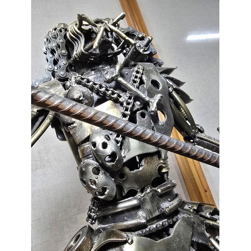 283 - A large and impressive handmade metal art sculpture of The Predator (49cm high) completely made from... 