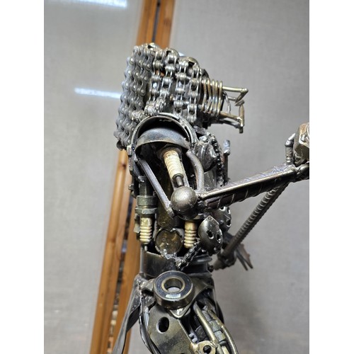 283 - A large and impressive handmade metal art sculpture of The Predator (49cm high) completely made from... 