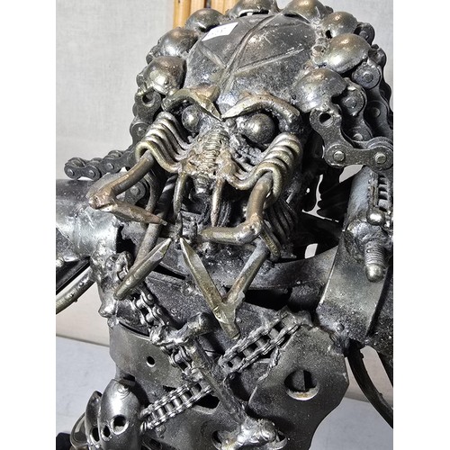 283 - A large and impressive handmade metal art sculpture of The Predator (49cm high) completely made from... 