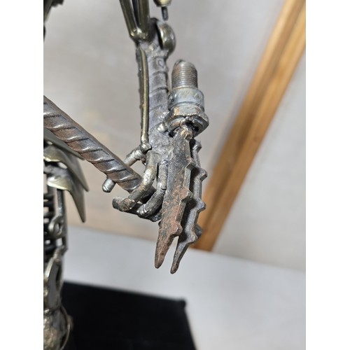 283 - A large and impressive handmade metal art sculpture of The Predator (49cm high) completely made from... 