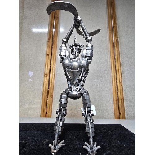 285 - A handmade very impressive metal art sculpture (36cm high) completely made from nuts and bolts spark... 