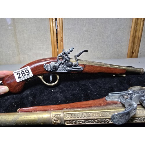 289 - A pair of stunning replica 18th Century flintlock pistols with solid wood frames and zinc barrel and... 