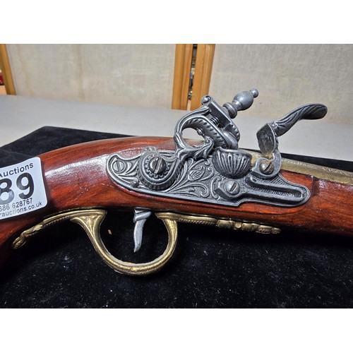 289 - A pair of stunning replica 18th Century flintlock pistols with solid wood frames and zinc barrel and... 