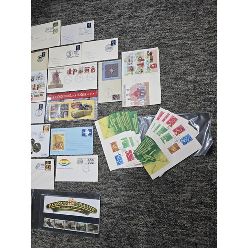 273 - A comprehensive collection of various first day covers and themed Royal Mail mint stamp sets which i... 