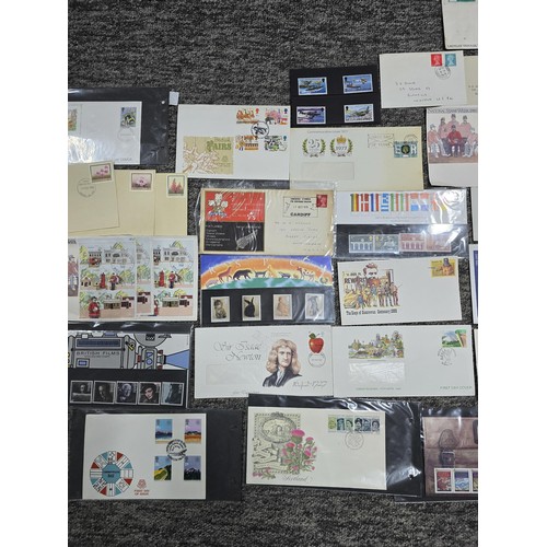 273 - A comprehensive collection of various first day covers and themed Royal Mail mint stamp sets which i... 